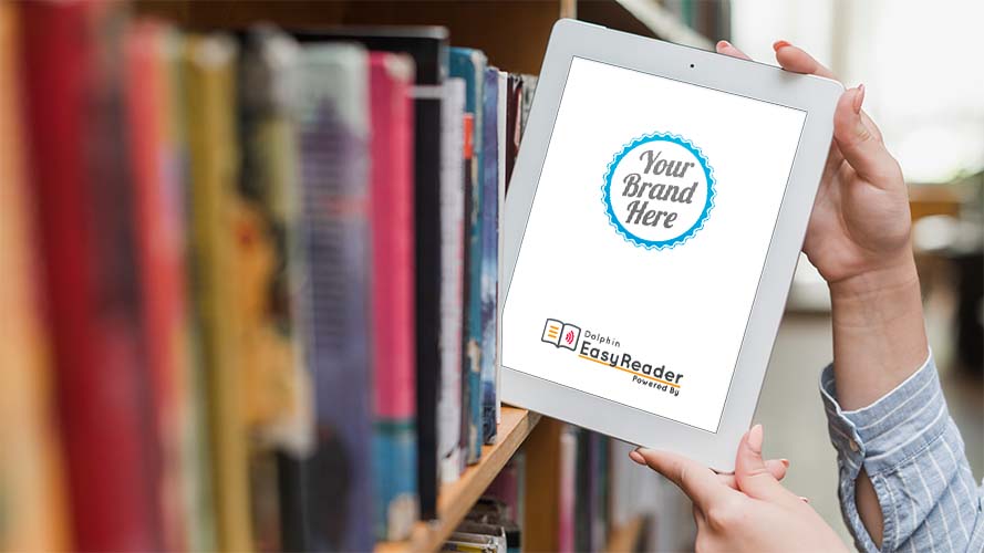 Person removing a digital tablet from a library bookshelf, with the words 'Your Brand Here' on the screen.
